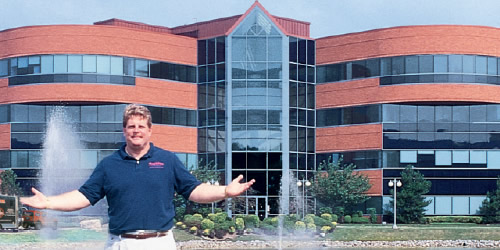 man standing in front of a potential client's building