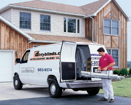 man delivering blinds